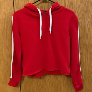 NEVER WORN. Red cropped sweatshirt with hood.
